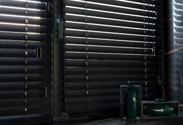 Mini blinds elegantly complementing the decor of a room, adding both style and functionality.